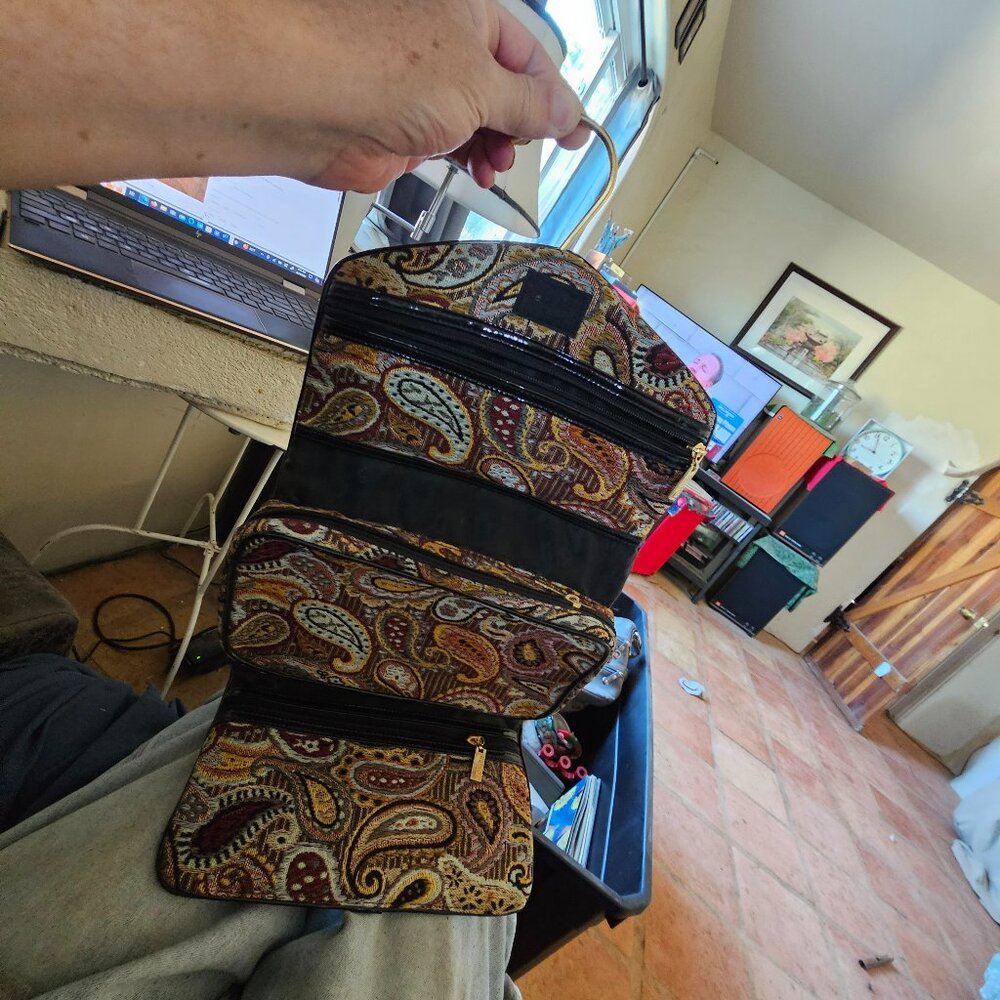 Purse size travel bag with hanger